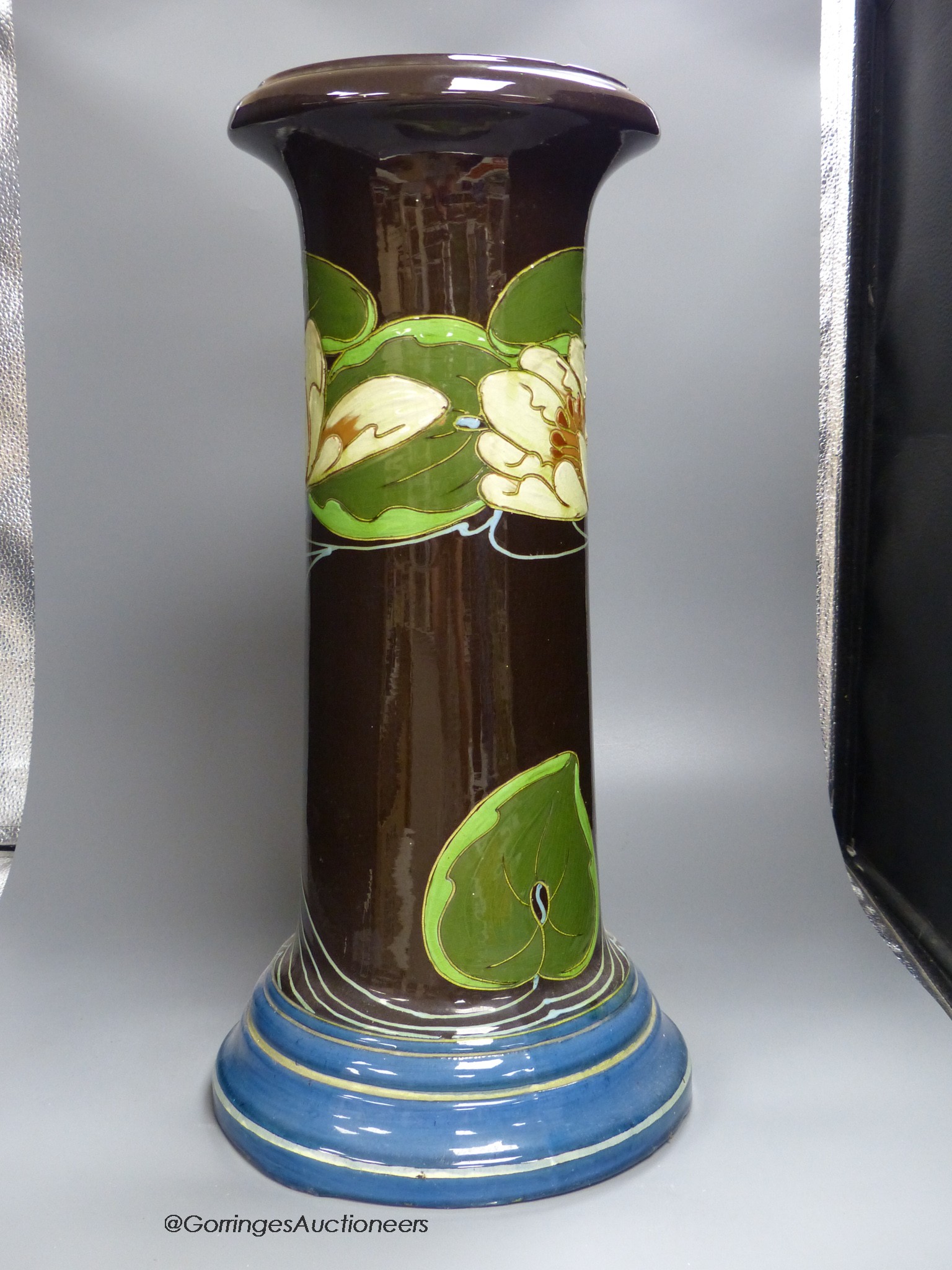 An Art Nouveau earthenware jardiniere, 53.5cm high